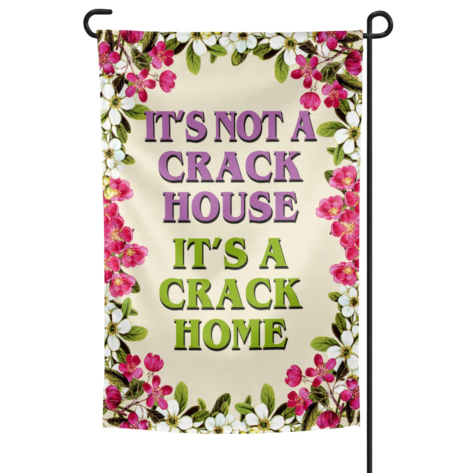 A rectangular garden flag with a floral border and a central text that reads 'IT'S NOT A CRACK HOUSE IT'S A CRACK HOME' in capital letters.